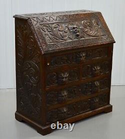 A George III Solid Carved Oak Chest, Green Man Writing Desk Bureau Circa 1880