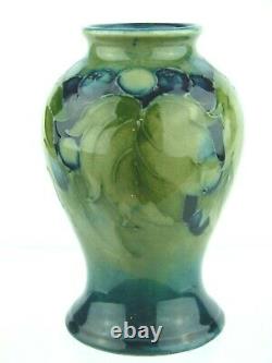 A Rare Wm Moorcroft Leaf & Berry on Celadon Baluster Vase. C1930