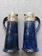 A Pair Of Highly Collectable Doulton Lambethware Art Nouveau Taper Jugs