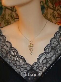 Art Nouveau 9ct gold peridot and pearl pendant with vintage chain