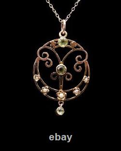 Art Nouveau 9ct gold peridot pendant with chain