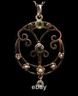 Art Nouveau 9ct gold peridot pendant with chain