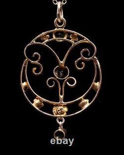 Art Nouveau 9ct gold peridot pendant with chain