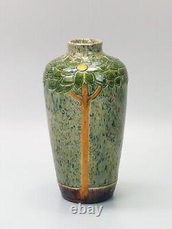 Art Nouveau Belgian pottery vase, drip glazed incised with tall flowers c1900
