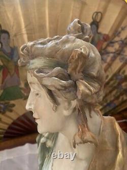 Art Nouveau Statue of a Lady guilded in gold and green dress