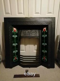 Cast iron tiled fireplace. Great condition. Art Nouveau style tiles in green