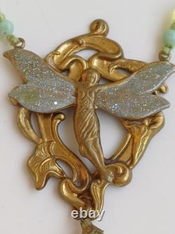 Czech Glass Uranium green Coloured Pendant Winged fairy Art Nouveau Grapes Vine