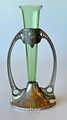 Delightful Art Nouveau vase in green glass