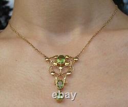 Fine Liberty & Co 15 carat gold with peridot Art Nouveau pendant necklace c1900