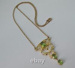 Fine Liberty & Co 15 carat gold with peridot Art Nouveau pendant necklace c1900