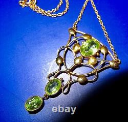 Fine Liberty & Co 15 carat gold with peridot Art Nouveau pendant necklace c1900