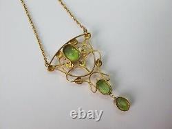 Fine Liberty & Co 15 carat gold with peridot Art Nouveau pendant necklace c1900