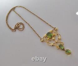 Fine Liberty & Co 15 carat gold with peridot Art Nouveau pendant necklace c1900