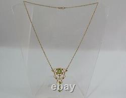 Fine Liberty & Co 15 carat gold with peridot Art Nouveau pendant necklace c1900