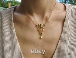 Fine Liberty & Co 15 carat gold with peridot Art Nouveau pendant necklace c1900