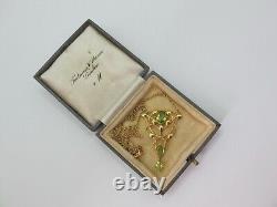 Fine Liberty & Co 15 carat gold with peridot Art Nouveau pendant necklace c1900