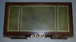 Flamed Mahogany With Green Leather Writing Surface Twin Pedestal Partner Desk
