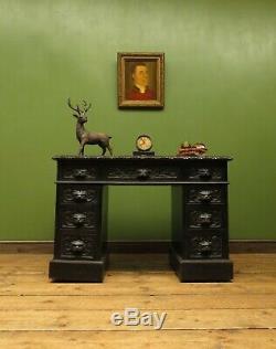 Green Man Carved Gothic Oak Pedestal Desk with Ebonized Finish and Leather Top