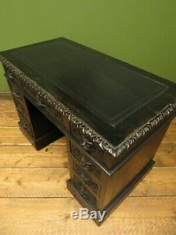 Green Man Carved Gothic Oak Pedestal Desk with Ebonized Finish and Leather Top