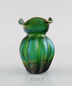 Pallme-König Art Nouveau vase in green iridescent art glass. Approx. 1900