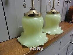 Two matching converted Antique brass ceiling lights green glass bell shades