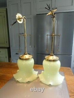 Two matching converted Antique brass ceiling lights green glass bell shades