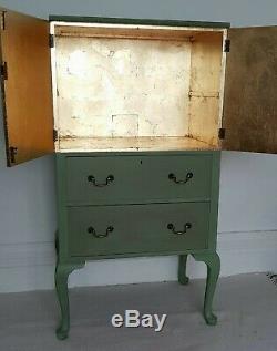 Vintage painted green tallboy, drinks cabinet, linen press, gold leaf interior