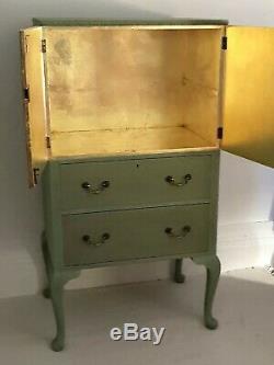 Vintage painted green tallboy, drinks cabinet, linen press, gold leaf interior